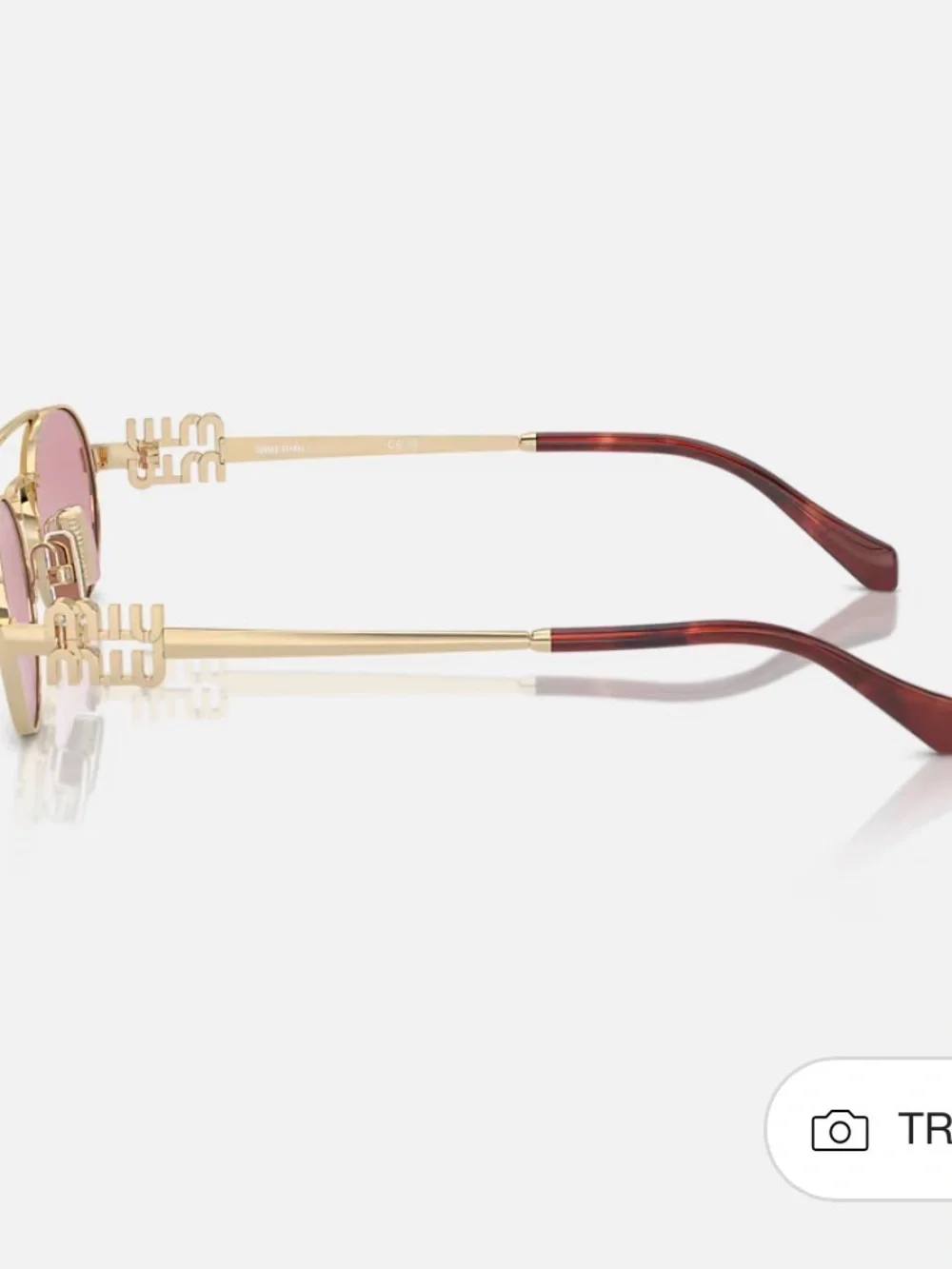 Miu Miu Gold Frame Sunglasses with Pink Lenses